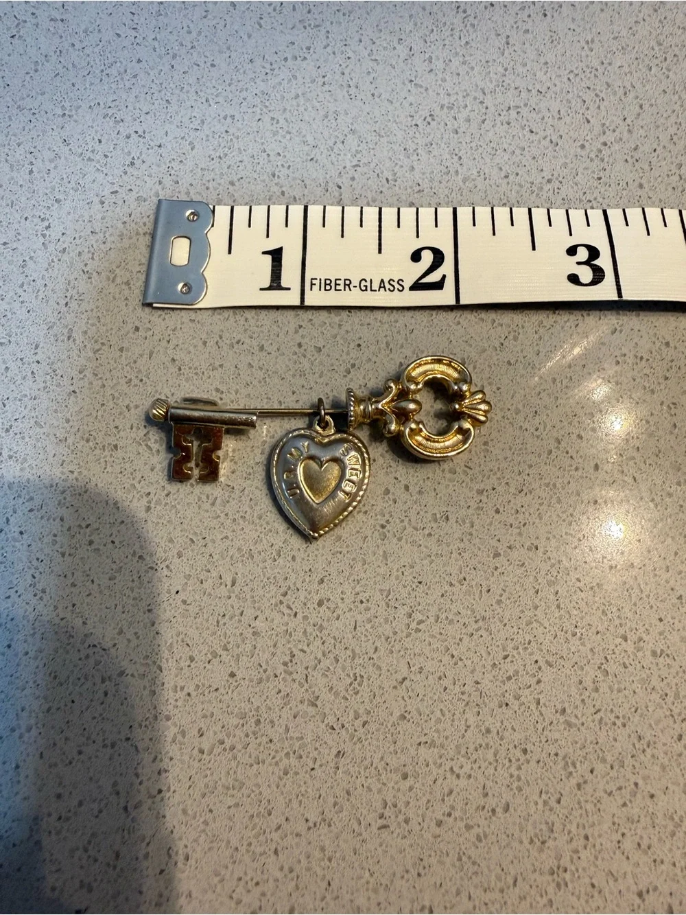 Golden Key Brooch with hanging heart